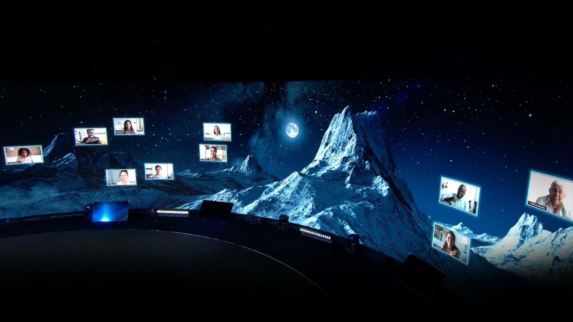 Attendee tiles composed into the event environment, not a viewer window